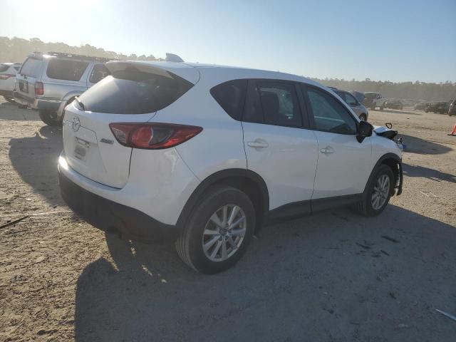 Photo 3 from auction – 2015 MAZDA CX-5 TOURI with VIN JM3KE2CY9F0523749
