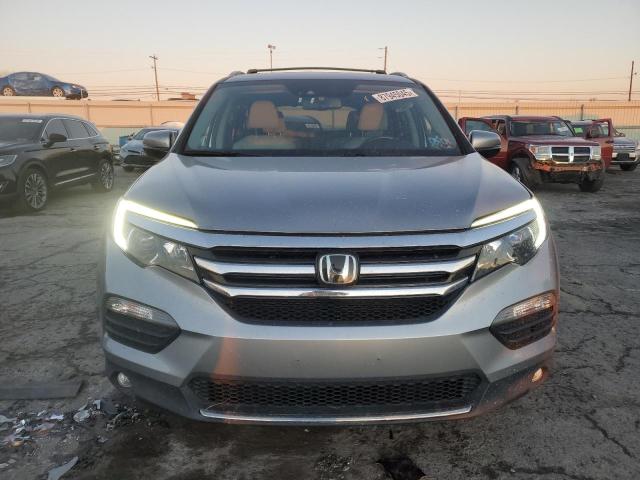 Photo 5 from auction – 2017 HONDA PILOT ELIT with VIN 5FNYF6H02HB055667