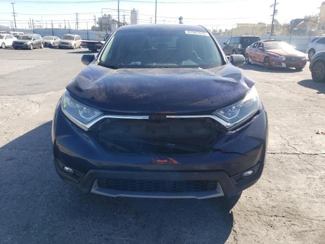 Photo 5 from auction – 2017 HONDA CR-V LX with VIN 7FARW5H38HE010018
