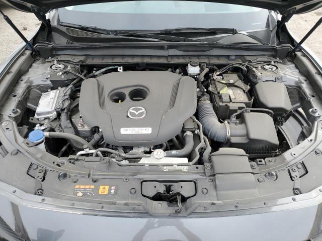 Photo 12 from auction – 2024 MAZDA CX-50 PREM with VIN 7MMVABEY8RN231046