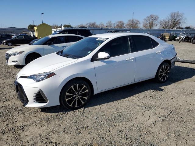 TOYOTA COROLLA L 2018 with VIN 2T1BURHE6JC121866 - Photo from auction