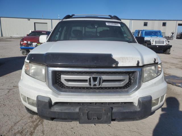 Photo 5 from auction – 2010 HONDA RIDGELINE with VIN 5FPYK1F58AB001901