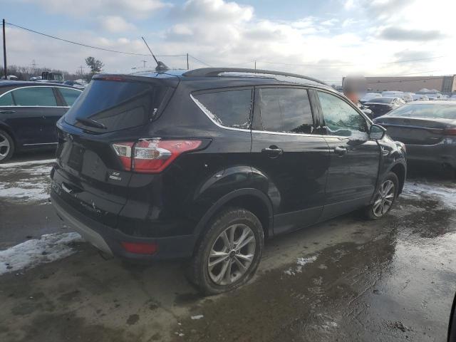 Photo 3 from auction – 2018 FORD ESCAPE SE with VIN 1FMCU9GD0JUB93271