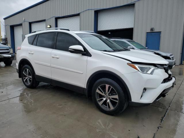 Photo 4 from auction – 2017 TOYOTA RAV4 XLE with VIN JTMRFREV9HJ707750