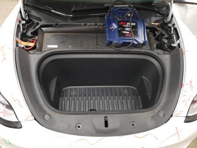 Photo 12 from auction – 2021 TESLA MODEL Y with VIN 5YJYGDEE7MF293820