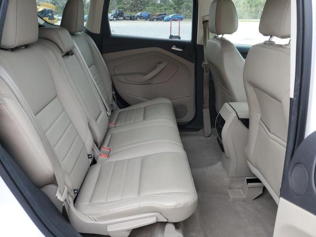 Photo 11 from auction – 2016 FORD ESCAPE TIT with VIN 1FMCU0J99GUB31411