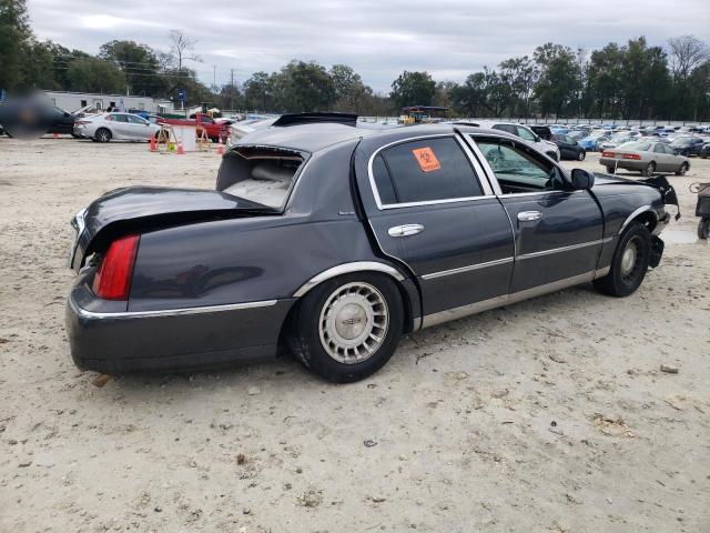 Photo 3 from auction – 2002 LINCOLN TOWN CAR E with VIN 1LNHM81WX2Y645781