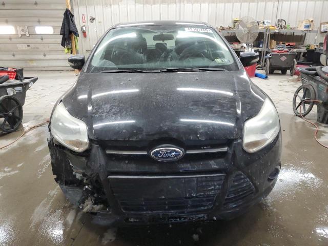 Foto 5 de la subasta – 2014 FORD FOCUS SE con VIN 1FADP3K27EL457218