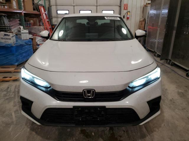 Photo 5 from auction – 2022 HONDA CIVIC LX with VIN 2HGFE2F24NH569907