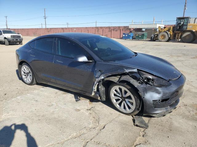 Photo 4 from auction – 2022 TESLA MODEL 3 with VIN 5YJ3E1EAXNF211544