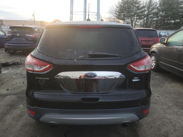 Photo 6 from auction – 2016 FORD ESCAPE SE with VIN 1FMCU9GX9GUA58616