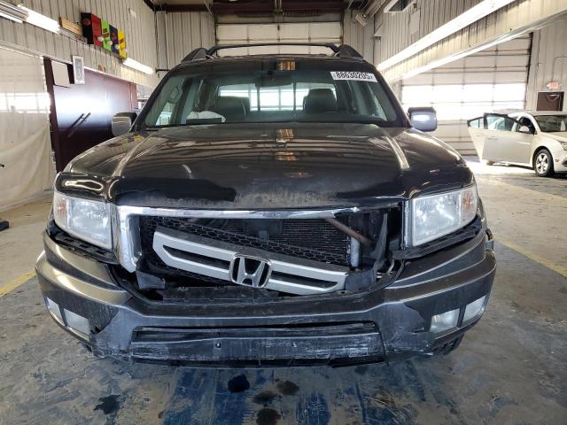 Photo 5 from auction – 2010 HONDA RIDGELINE with VIN 5FPYK1F56AB006529