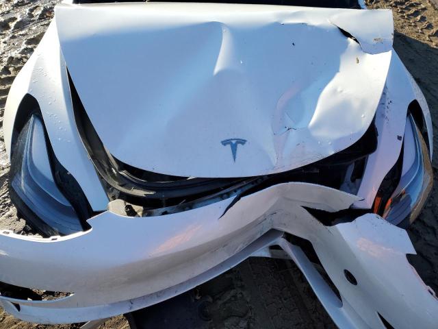 Photo 11 from auction – 2023 TESLA MODEL 3 with VIN 5YJ3E1EC8PF502757