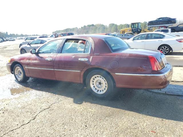 Photo 2 from auction – 2000 LINCOLN TOWN CAR E with VIN 1LNHM81W1YY918390