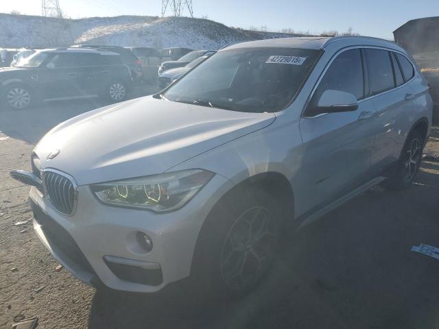 BMW X1 XDRIVE2 2017 with VIN WBXHT3C32H5F69227 - Photo from auction