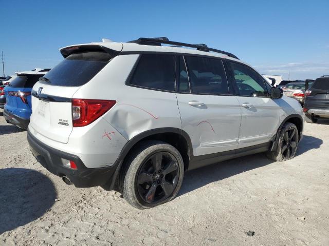 Photo 3 from auction – 2021 HONDA PASSPORT E with VIN 5FNYF8H07MB022007