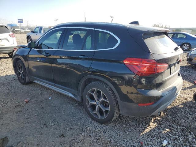 Photo 2 from auction – 2016 BMW X1 XDRIVE2 with VIN WBXHT3C35G5E53423