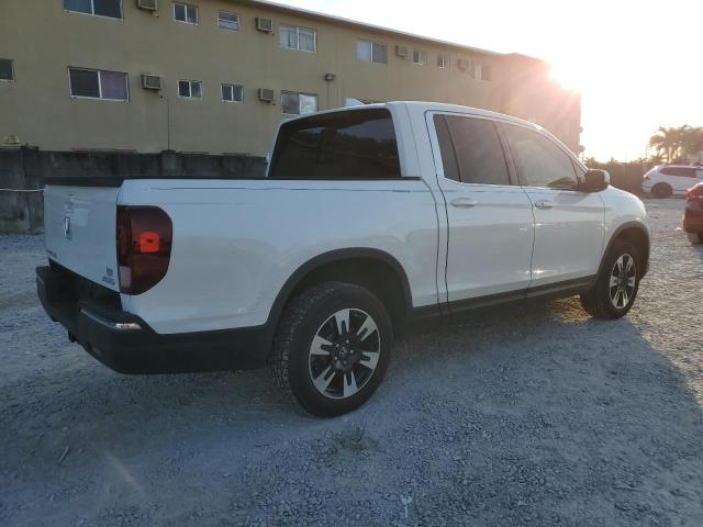 Photo 3 from auction – 2020 HONDA RIDGELINE with VIN 5FPYK3F55LB024342