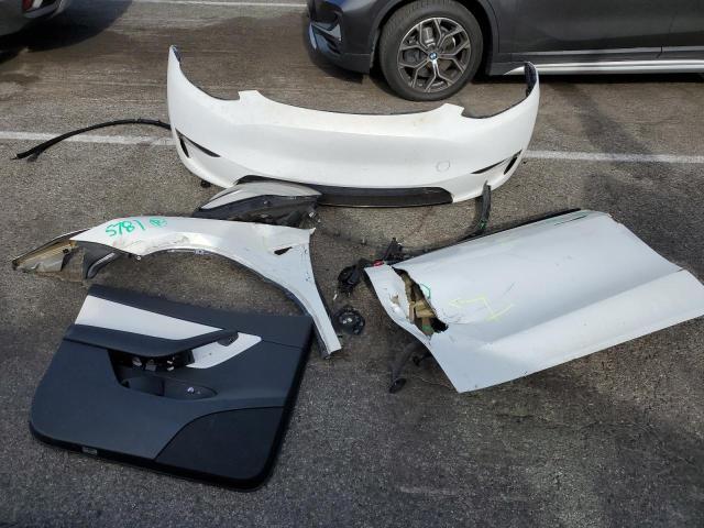 Photo 13 from auction – 2021 TESLA MODEL Y with VIN 5YJYGDED8MF163004