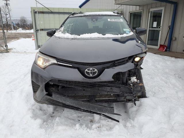Photo 5 from auction – 2018 TOYOTA RAV4 LE with VIN JTMBFREV7JJ212857