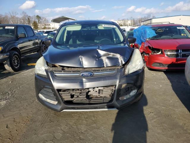 Foto 5 de la subasta – 2015 FORD ESCAPE SE con VIN 1FMCU0G77FUC32077