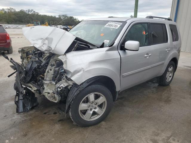 HONDA PILOT EXL 2011 with VIN 5FNYF4H65BB016166 - Photo from auction