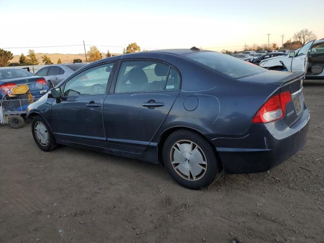 Photo 2 from auction – 2010 HONDA CIVIC HYBR with VIN JHMFA3F21AS007173