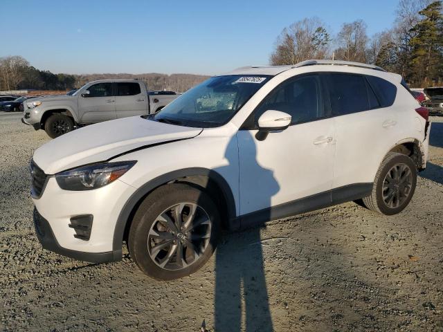 MAZDA CX-5 GT 2016 with VIN JM3KE4DY7G0899314 - Photo from auction