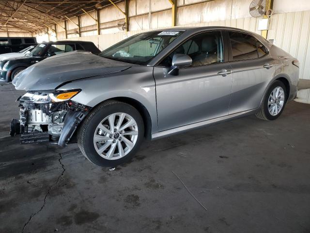 TOYOTA CAMRY LE 2022 with VIN 4T1C11AK2NU057568 - Photo from auction
