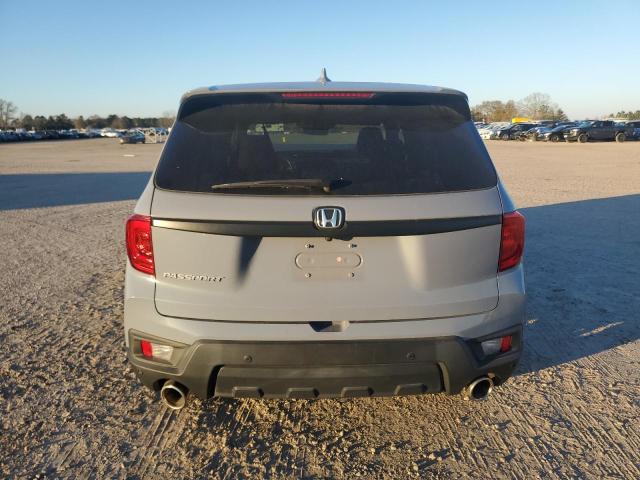 Photo 6 from auction – 2022 HONDA PASSPORT E with VIN 5FNYF7H55NB004452