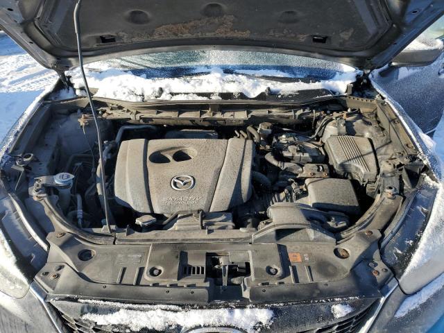 Photo 12 from auction – 2014 MAZDA CX-5 SPORT with VIN JM3KE2BE9E0388357