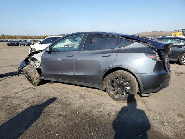 Photo 2 from auction – 2023 TESLA MODEL Y with VIN 7SAYGDED6PF933983