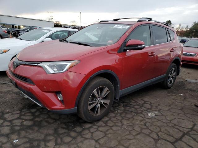TOYOTA RAV4 XLE 2017 with VIN JTMRFREV5HJ169791 - Photo from auction