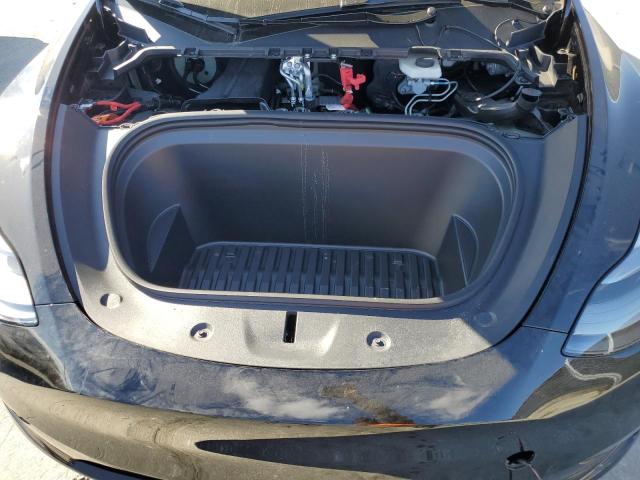 Photo 11 from auction – 2023 TESLA MODEL Y with VIN 7SAYGDEE6PA201875