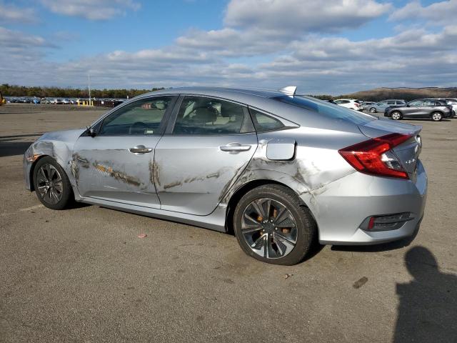 Photo 2 from auction – 2018 HONDA CIVIC EX with VIN JHMFC1F38JX031710