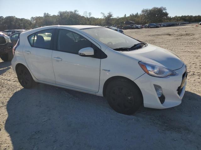 Photo 4 from auction – 2015 TOYOTA PRIUS C with VIN JTDKDTB34F1097308