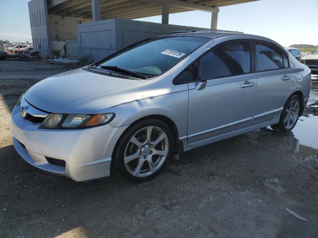 HONDA CIVIC LX 2011 with VIN 19XFA1F52BE011690 - Photo from auction
