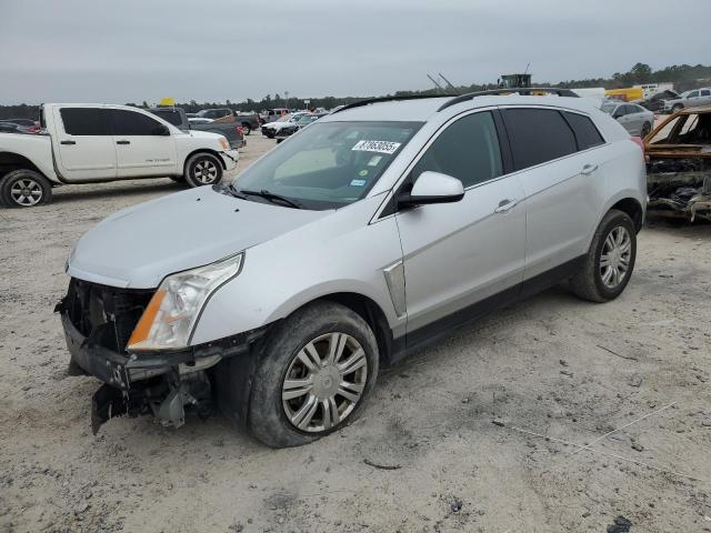 CADILLAC SRX 2014 with VIN 3GYFNAE33ES547939 - Photo from auction