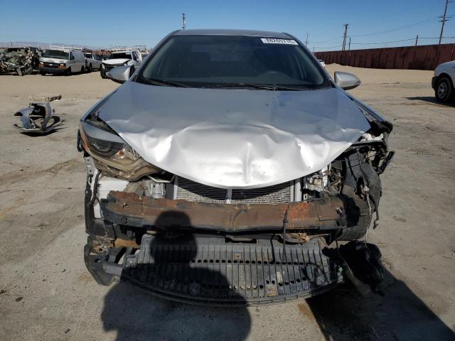 Photo 5 from auction – 2014 TOYOTA COROLLA L with VIN 5YFBURHE5EP106779