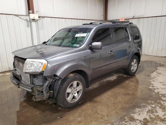 HONDA PILOT EXL 2011 with VIN 5FNYF4H69BB068531 - Photo from auction