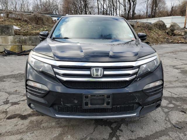 Photo 5 from auction – 2017 HONDA PILOT TOUR with VIN 5FNYF6H92HB088392