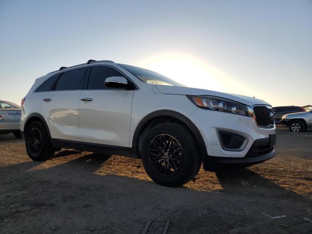 Photo 4 from auction – 2016 KIA SORENTO LX with VIN 5XYPG4A50GG095000
