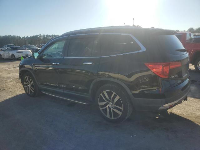 Photo 2 from auction – 2016 HONDA PILOT TOUR with VIN 5FNYF6H92GB030295