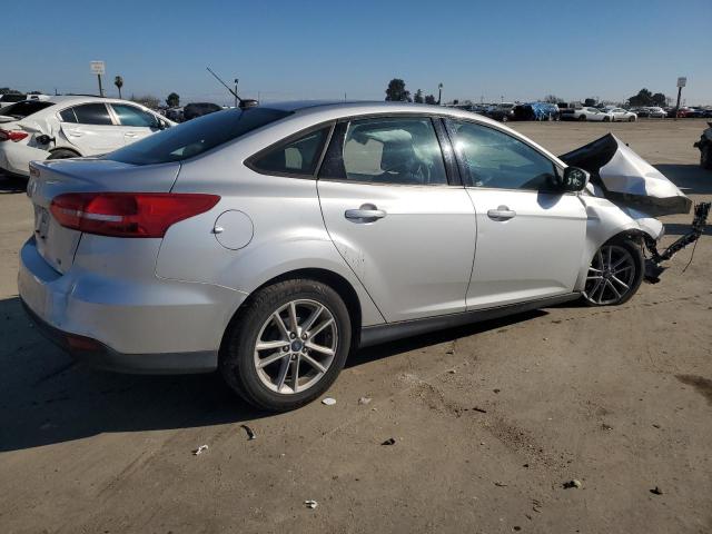 Photo 3 from auction – 2018 FORD FOCUS SE with VIN 1FADP3F27JL288693
