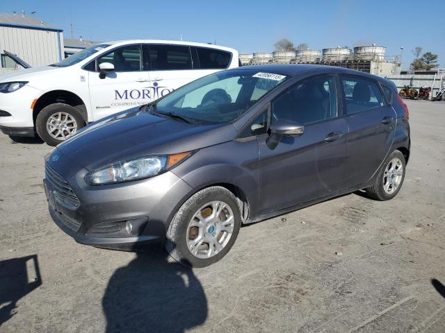 FORD FIESTA SE 2014 with VIN 3FADP4EJ9EM117950 - Photo from auction