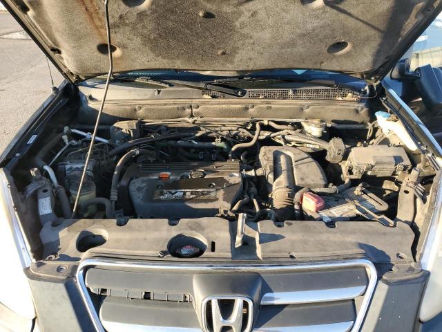 Photo 12 from auction – 2005 HONDA CR-V LX with VIN JHLRD68585C008161