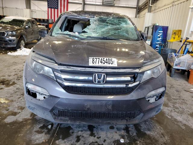 Photo 5 from auction – 2018 HONDA PILOT LX with VIN 5FNYF6H13JB044160
