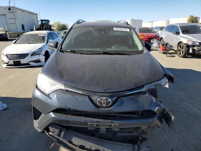 Photo 5 from auction – 2018 TOYOTA RAV4 LE with VIN JTMZFREV7JJ200822
