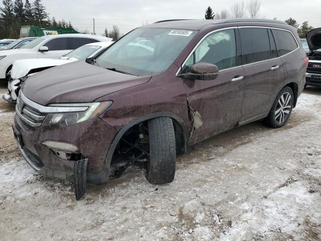 HONDA PILOT TOUR 2016 with VIN 5FNYF6H98GB511474 - Photo from auction