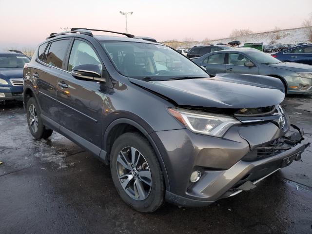 Photo 4 from auction – 2016 TOYOTA RAV4 XLE with VIN 2T3RFREV7GW465623